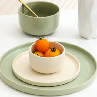 japanese ceramic dinnerware earthworks minimalist green porcelain plates bowls set side view