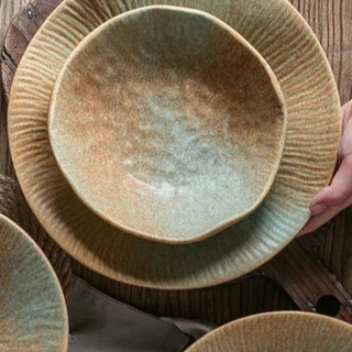 japanese ceramic dinnerware earthworks handcrafted porcelain bowls elegant plates set close-up