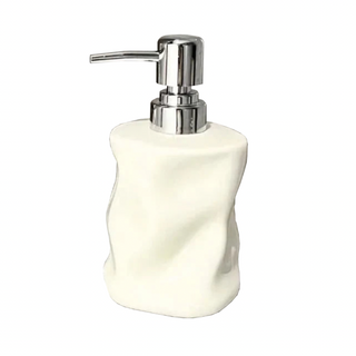 handcrafted ceramic lotion dispenser bathroom close-up