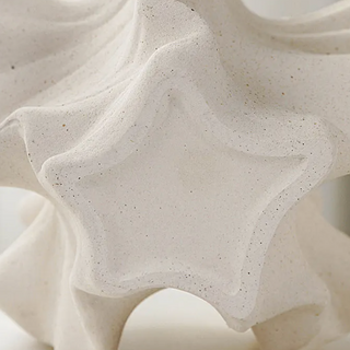 designer coral vase handcrafted porcelain ceramic beige modern minimalist decor angle view
