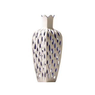 hollow ceramic vase modern minimalist handcrafted decorative flower holder close-up
