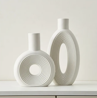 minimalist oval vase ceramic porcelain set scandi luxury home decor close-up