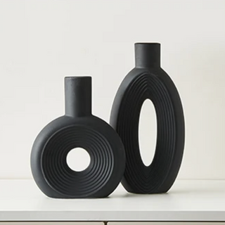 minimalist oval vase black porcelain ceramic vase set scandi luxury decor close-up