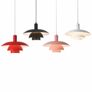 Close-up of layered shell pendant — precision-crafted designer lamp