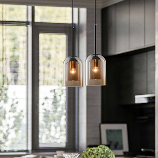 Close-up of rust glass pendant light — layered dual-glass fixture