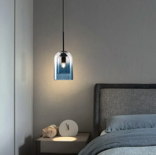 Gradient blue polished glass pendant in dining room — contemporary fixture