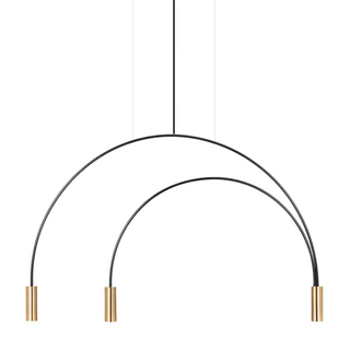 Brass Arca pendant light hanging in a contemporary dining space
