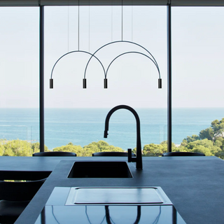 Modern black hanging lamp detail — brushed metal finish ceiling light