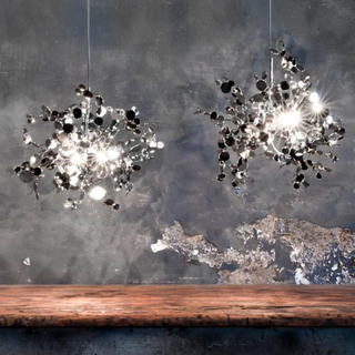 Metal disc chandelier detail — handcrafted designer pendant fixture