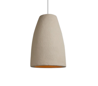 Modern metal pendant lamp hanging in a contemporary interior