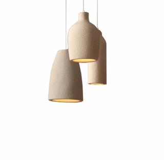 Handcrafted pendant lamp close-up — premium metal finish with LED