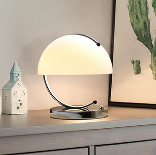 Elegant dome shade lamp — chrome base close-up detail