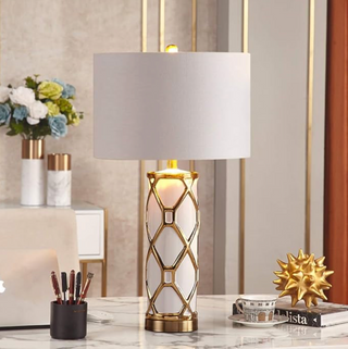 Elegant white gold lamp — intricate lattice close-up