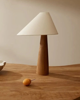 Handcrafted wooden table lamp — natural wood close-up detail