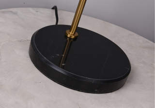Sphere brass arc designer lamp — warm glow elegant setting