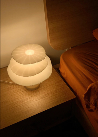 Unique layered lamp side view — stylish soft glow design