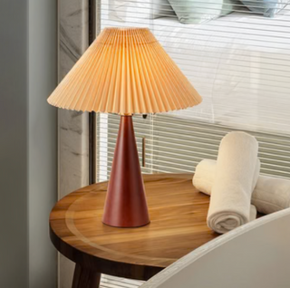Elegant pleated table lamp close-up — chic shade detail