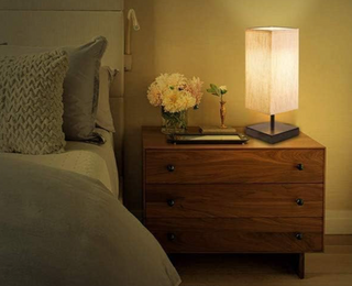Ivory tower lamp illuminated — modern soft ambient glow
