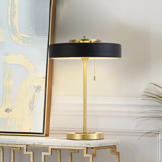 Black table lamp — elegant gold accent soft warm glow