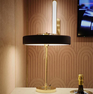 Elegant black gold table lamp — warm ambient glow setting