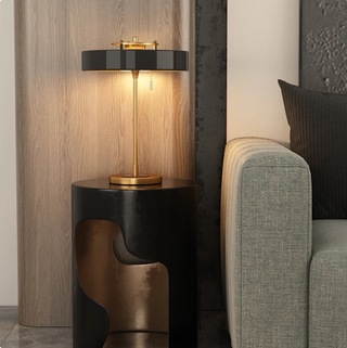 Black table lamp gold accent — elegant warm ambient setting