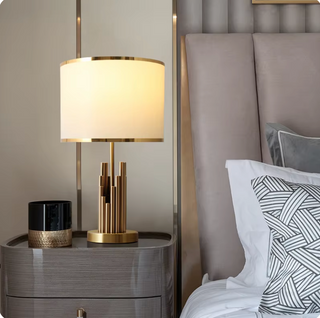 Modern golden spire lamp side — architectural ambient light