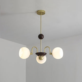 Cream glass ribbed chandelier setting — contemporary dining wide