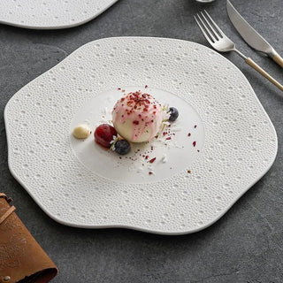 exotic ceramic plate earthworks handcrafted porcelain tableware luxury dining plate close-up