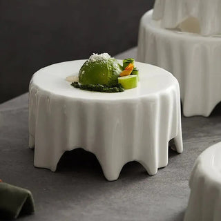 ceramic dinner plate earthworks handcrafted porcelain dishware luxury dining tableware close-up