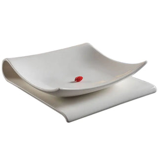 folded ceramic plate earthworks handcrafted porcelain serving dish luxury dining dishwasher safe front view