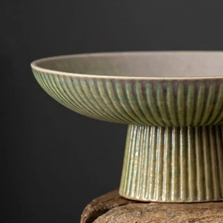 vintage ceramic bowl earthworks handcrafted porcelain serving dish earth tone display close-up