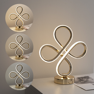 Modern gold continuous loop lamp — elegant warm ambient glow