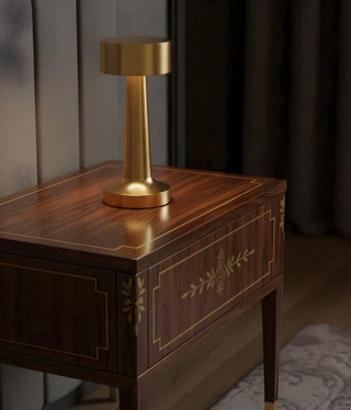 Modern T-bar desk lamp close-up — cordless iron detail