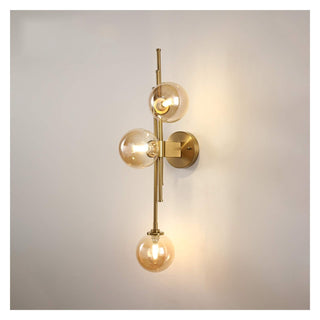 Three head globe vintage glass wall sconce detail — artistic