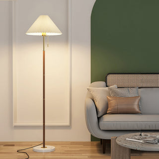 Vintage metal pleated lamp detail — marble base texture