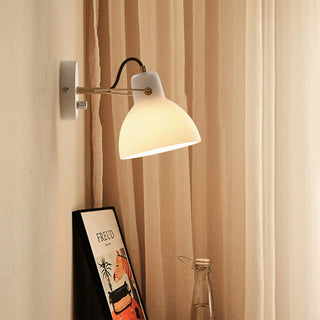 White glass wall lamp soft ambient angle — minimalist sconce