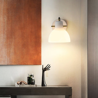 White glass minimalist wall lamp illuminated — soft ambient