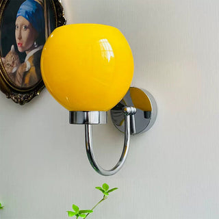 Iron frame cream globe Bauhaus sconce detail — modern lamp