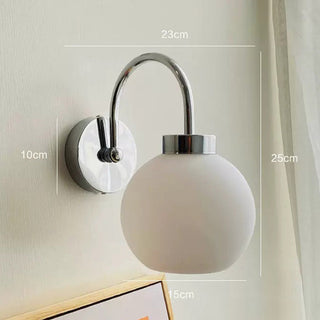 Cream glass globe Bauhaus wall lamp ambient — iron frame sconce