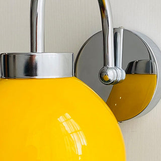 Bauhaus iron frame cream globe wall sconce — modern lamp