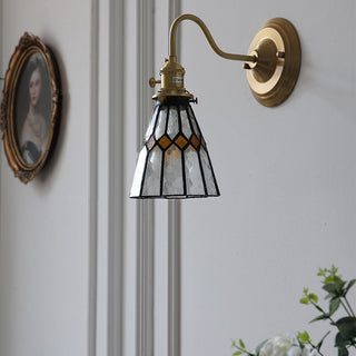 Brass dimmable Tiffany glass wall sconce ambient — vibrant