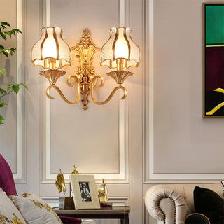 Mid-century gold wall sconce detail — contemporary metal light