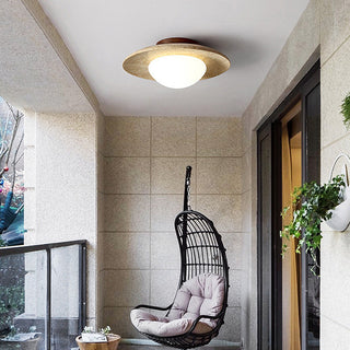 Industrial stone wall lamp walnut detail — beige contemporary