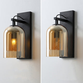 Glass cylinder Scandinavian wall sconce in hallway — soft glow