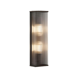Minimalist outdoor wall sconce detail — contemporary warm glow LED