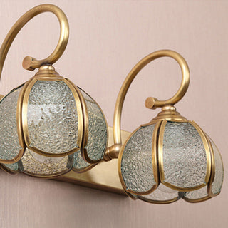 Classic multi head glass ball wall sconce in bathroom — vanity lamp