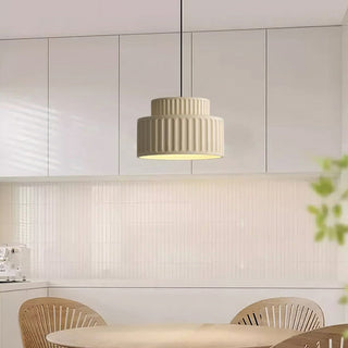 Resin hanging pendant over dining room table