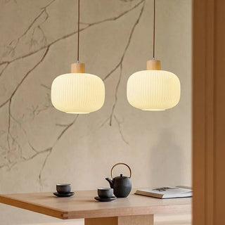 Warm ambient pendant with classic lantern glass design
