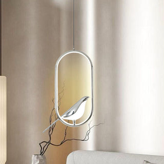 Modern gold bird pendant for eclectic living room design
