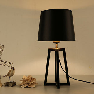 Modern black designer table lamp — sleek shade soft glow